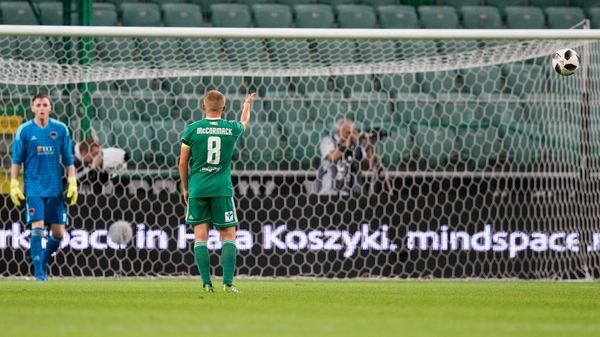 Connor McCormack speaks to Peter Cherrie after Cork concede the first goal of the game