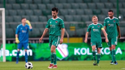 Jimmy Keohane and his Cork City team-mates dejected after conceding the opening goal against Legia Warsaw