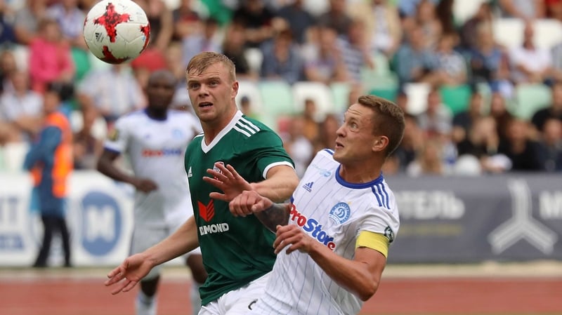 Derry's Aaron Splaine battles for possession Artem Bykov