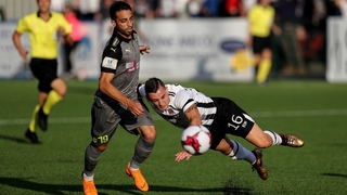 AEK's Thomas Ioannou tangles with Dylan Connolly