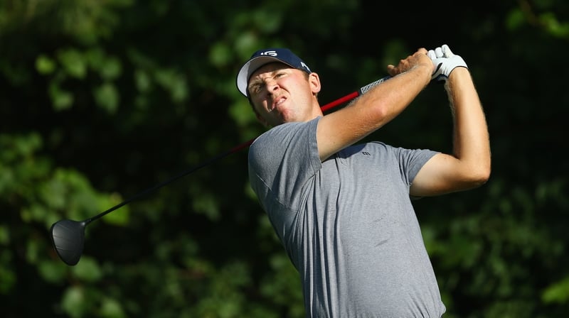 Power plays his tee shot on the 16th at Glen Abbey
