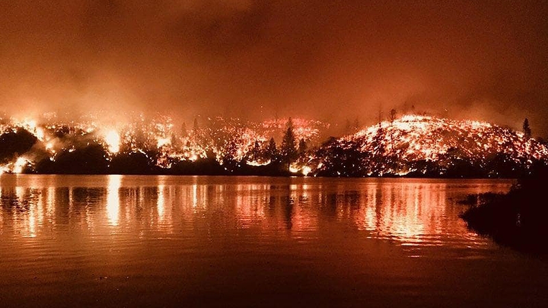 A bulldozer operator and a member of the Redding Fire Department were killed in the blaze