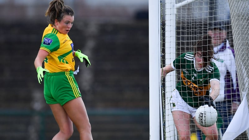 Eilis Lynch of Kerry can't prevent the ball going over the line for a goal scored by Eilish Ward of Donegal