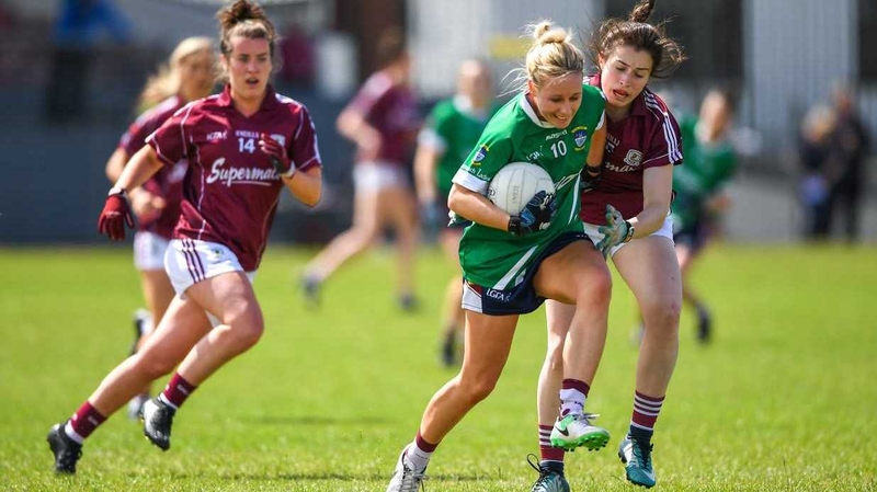 Fiona Claffey of Westmeath breaks free from the grasp of Leanne Coen