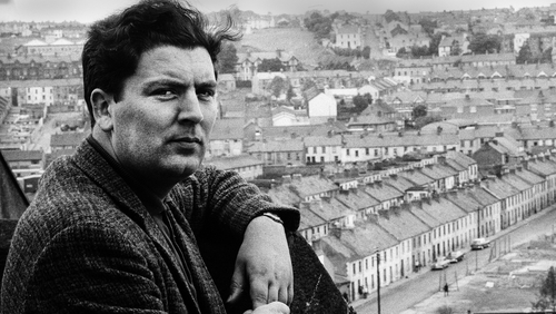 John Hume pictured on a rooftop overlooking Derry's Bogside in 1970
