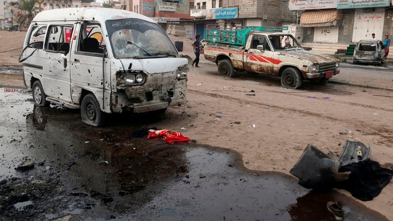 The aftermath of an air strike at the entrance to Al-Thawra Hospital in the city of Hudaydah