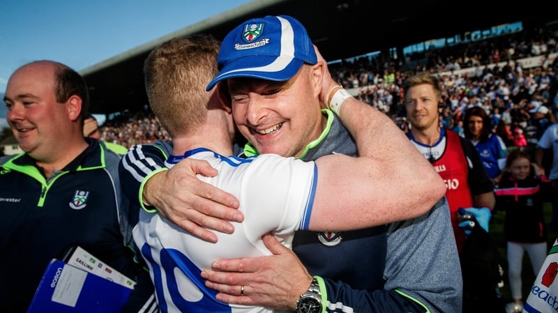 Malachy O'Rourke celebrates with defender Colin Walshe