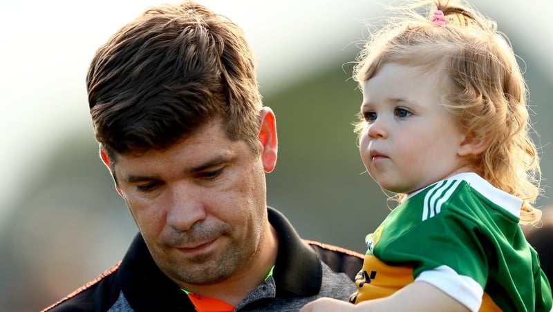 Eamonn Fitzmaurice and his daughter Faye after the game
