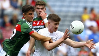 Kildare's David Marnell in action against Mayo's Tommy Conroy
