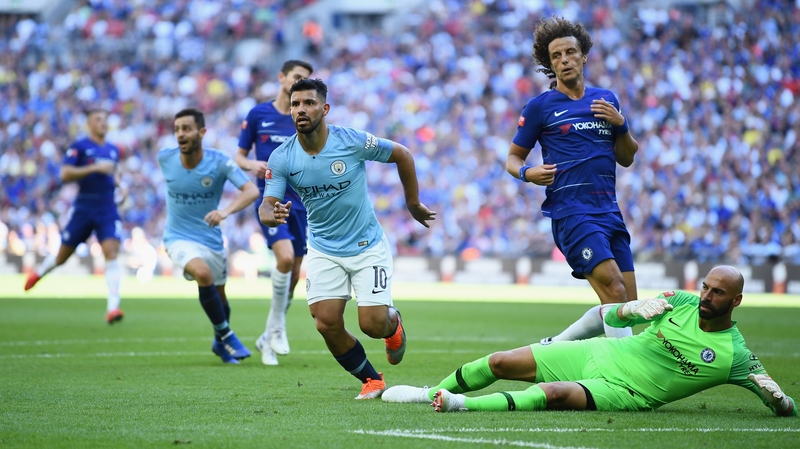 Sergio Aguero scores one of his two goals against Chelsea at Wembley