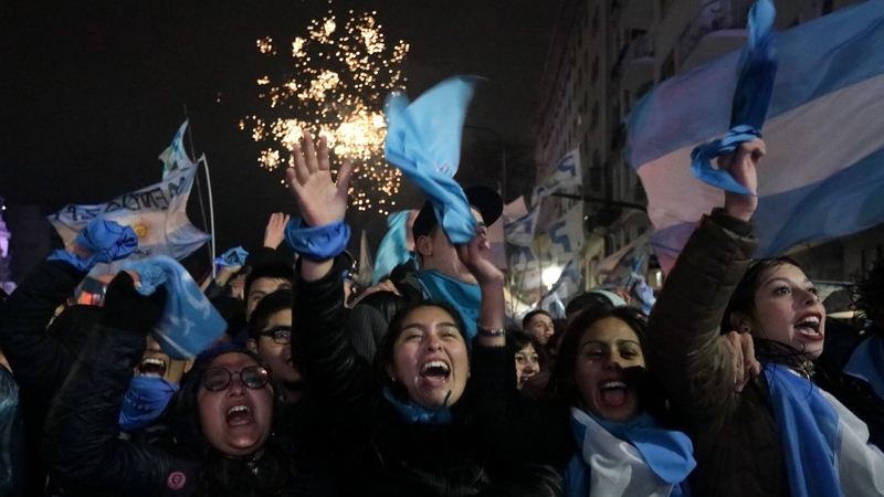 Anti-abortion campaigners celebrate outside Congress in Buenos Aires