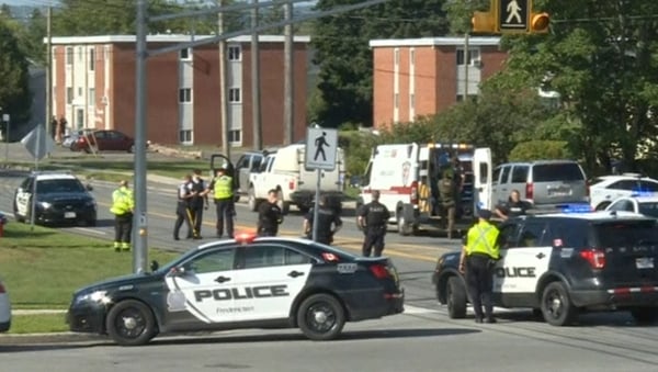 Local media images showed emergency vehicles converging on a tree-lined residential street