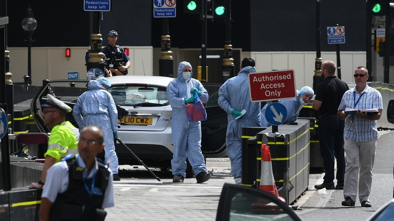 Silver Ford Fiesta is examined by forensic officers