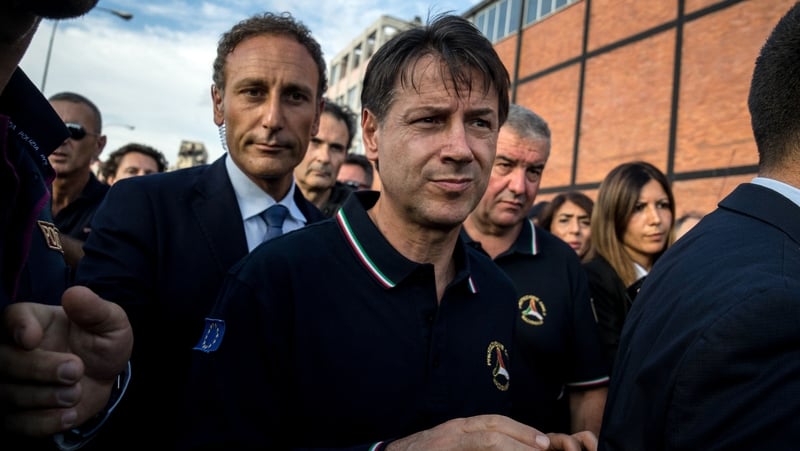 Giuseppe Conte at the scene in Genoa after yesterday's bridge collapse