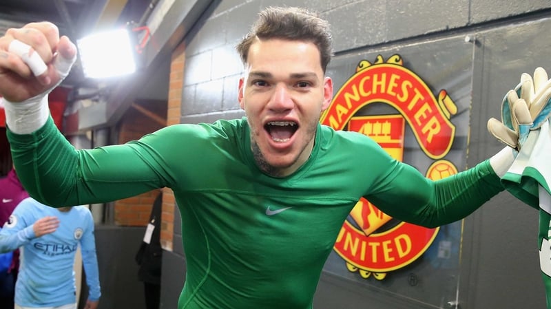 Ederson celebrates Manchester City's win at Old Trafford last December