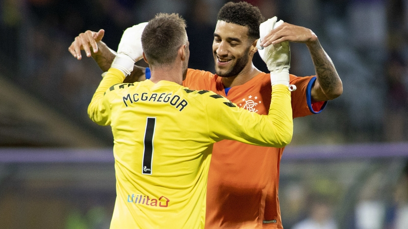 Connor Goldson celebrates with Allan McGregor