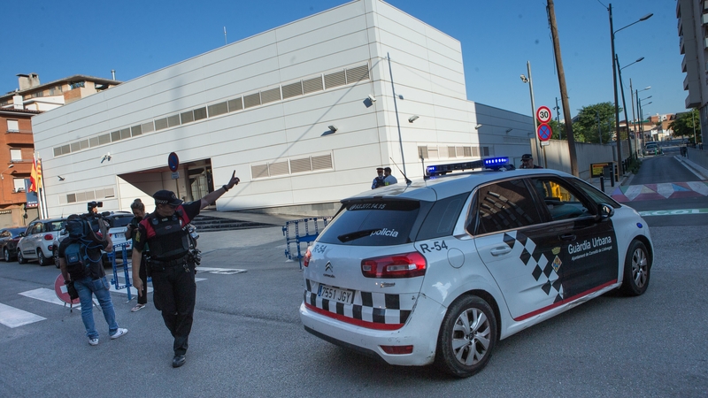 The man was shot dead after he entered the police station in Barcelona