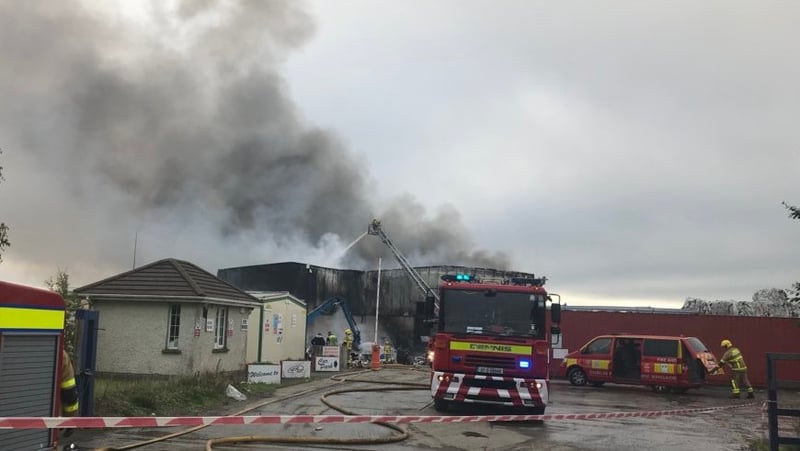 Residents told to keep windows closed as smoke rises into the sky