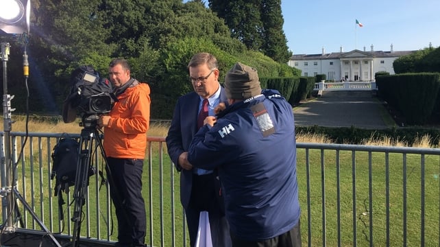 Getting ready for RTÉ's television coverage of the Pope's visit. Presenter Bryan Dobson with cameraman Magnus Kelly and sound engineer Danny McDonald at Áras an Uachtaráin