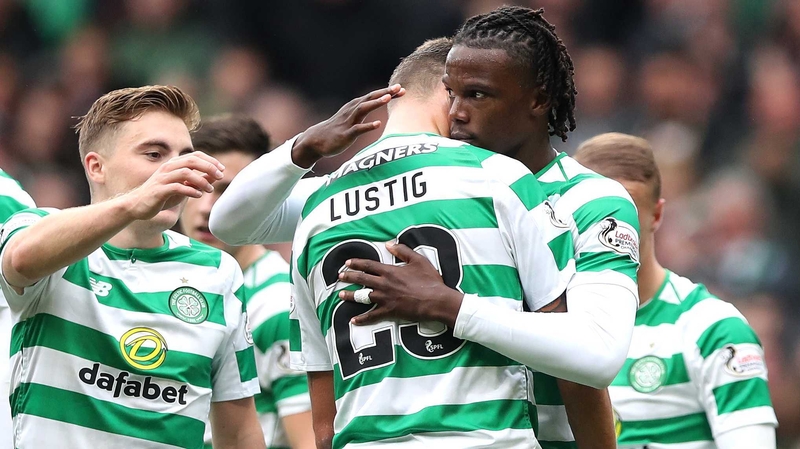 Dedryck Boyata is swamped by team-mates after his decisive goal