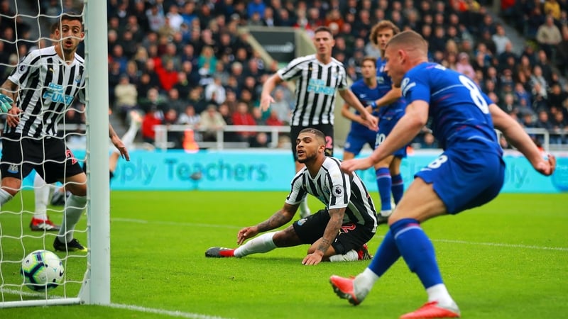 Dendre Yedlin looks on after scoring an own goal