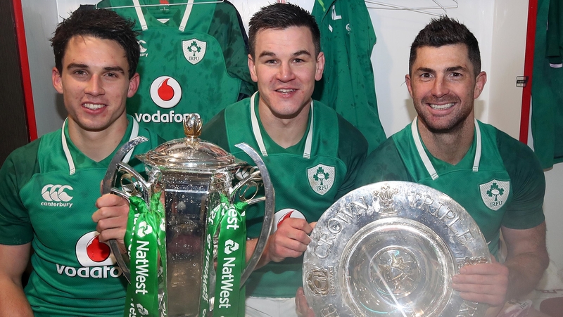Joey Carbery, Johnny Sexton and Rob Kearney celebrate last season's Grand Slam win