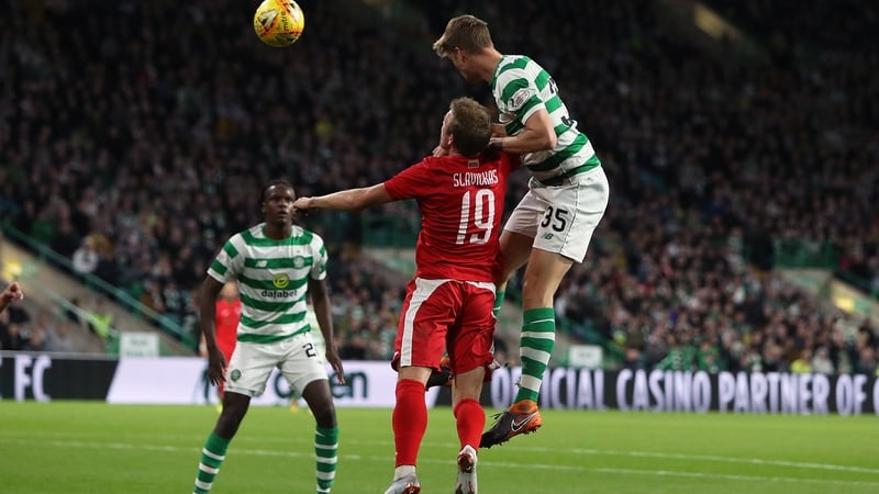 Kristoffer Ajer of Celtic scores their third goal