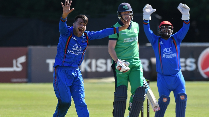 Afghanistan's Rashid Khan (L) appeals for lbw against Ireland's Kevin O'Brien