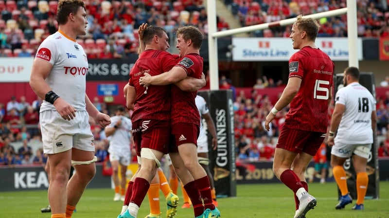 Munster's Tommy O'Donnell celebrates his try with Neil Cronin