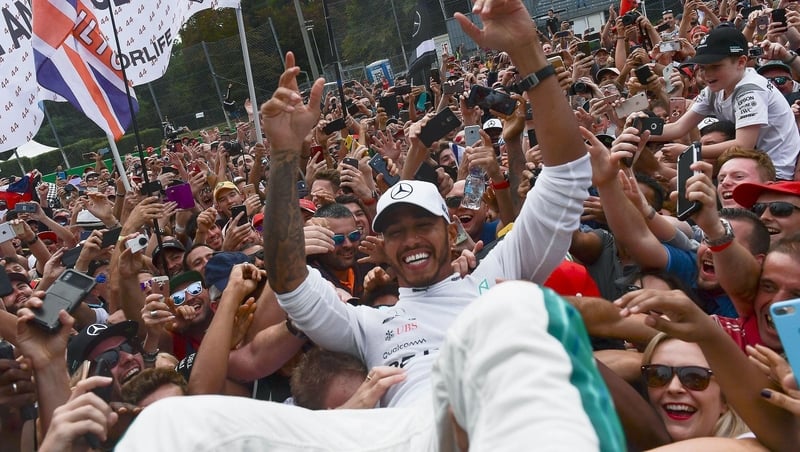 Lewis Hamilton celebrates his win