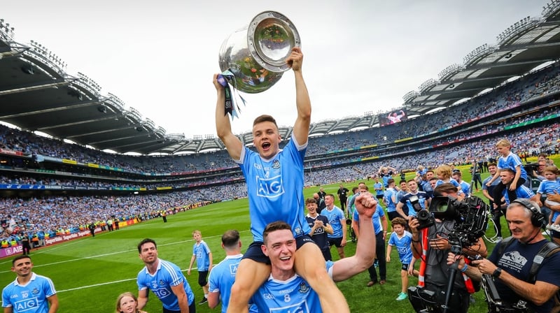 Eoin Murchan holds the Sam Maguire trophy aloft on the shoulders of Brian Fenton