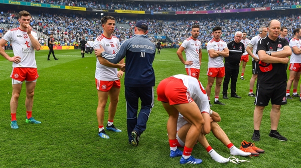 Jim Gavin commiserates with Ronan O'Neill after the final whistle