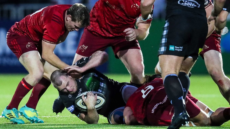 Glasgow Warrior's Stuart Hogg squirrels away from Arno Botha