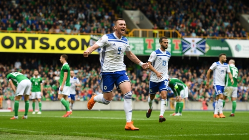 Haris Duljevi celebrates Bosnia and Herzegovina's opening goal at Windsor Park