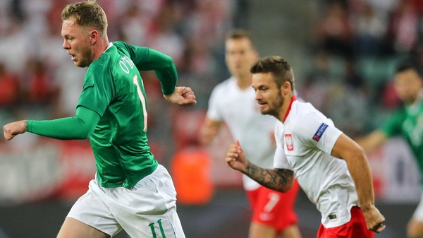 Ireland's Aiden O'Brien evades Karol Linetty