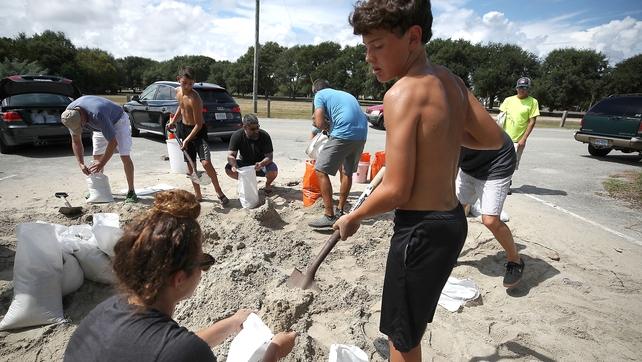 Residents prepare to keep storm waters at bay in the coastal area of Wrightsville Beach