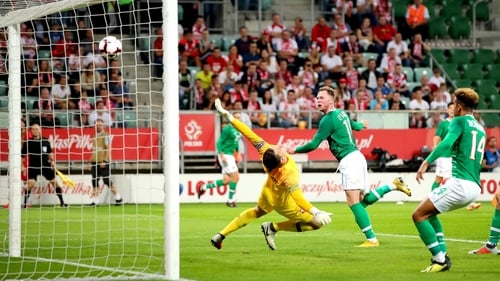 Aiden O'Brien heads home, marking his debut with a goal in Wroclaw