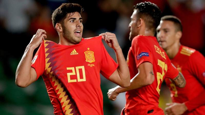 Marco Asensio celebrates scoring Spain's second goal