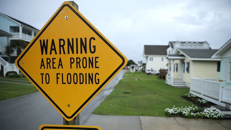 Neighborhoods are empty of residents as the effects of Hurricane Florence begin to bear down