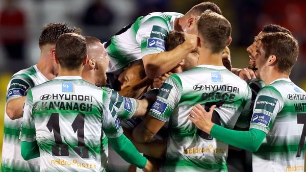 Greg Bolger is mobbed after his goal