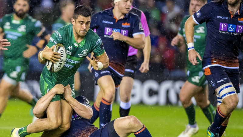 Edinburgh's Matt Scott tackles Tiernan O'Halloran of Connacht