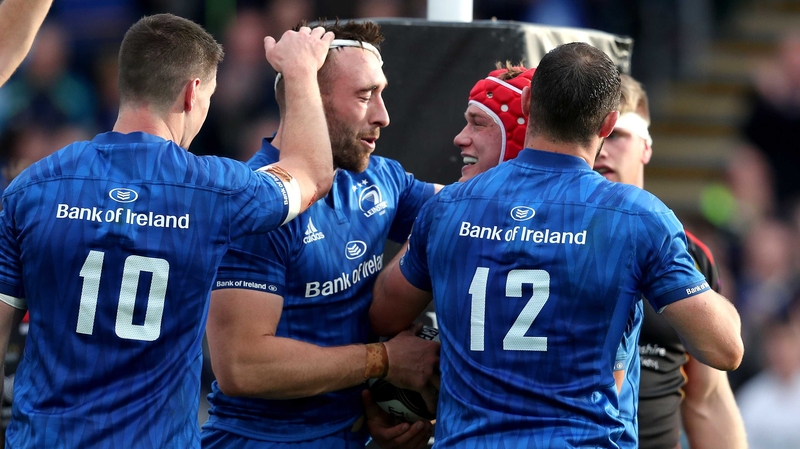 Leinster's Josh van der Flier celebrates his try with Jack Conan, Johnny Sexton and Robbie Henshaw