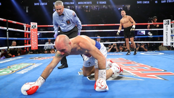 Referee Mora counts out O'Sullivan
