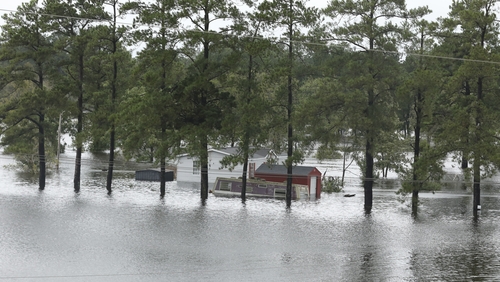 Flooding near Interstate Highway 95 in Lumberton, North Carolina. Roads have been closed and authorities have warned of landslides