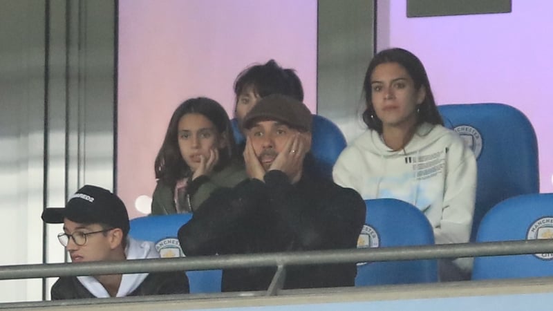 Guardiola watches on from his private box