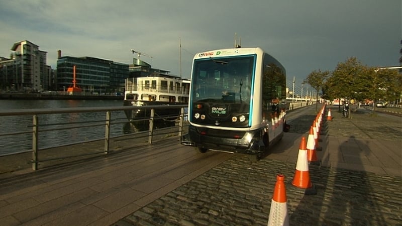 The EZ10 shuttle makes its way alongside the Liffey