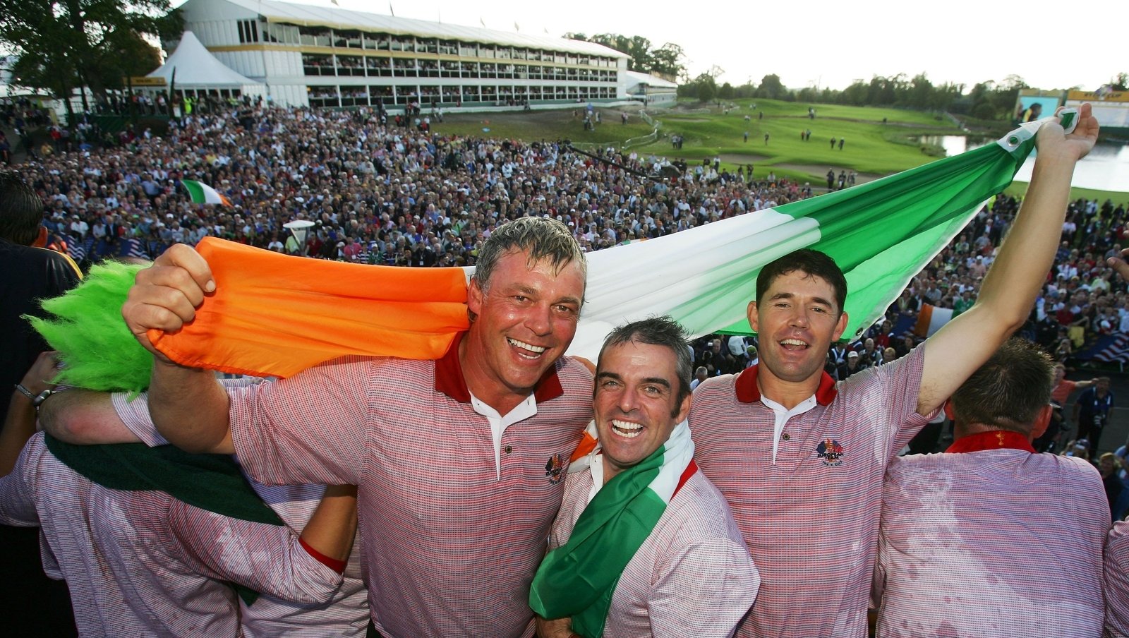 Darren Clarke, Paul McGinley and Padraig Harrington with the tricolour after the 2006 Ryder Cu