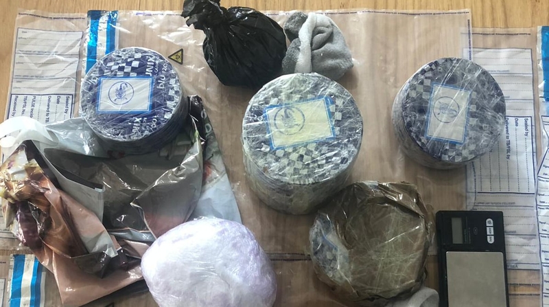 Officers seized heroin, cocaine and a number of shotgun cartridges