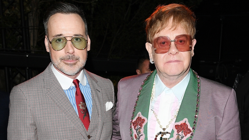 David Furnish and Elton John accept libel damages over dog attack story