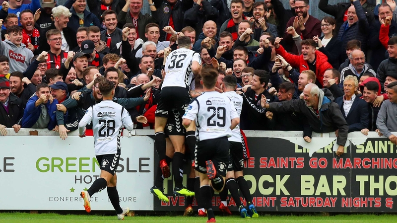 Bohs mob Ali Reghba in front of the travelling fans